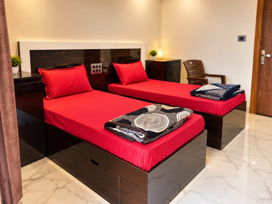 Two-sharing room interior at the Rishikesh yoga school