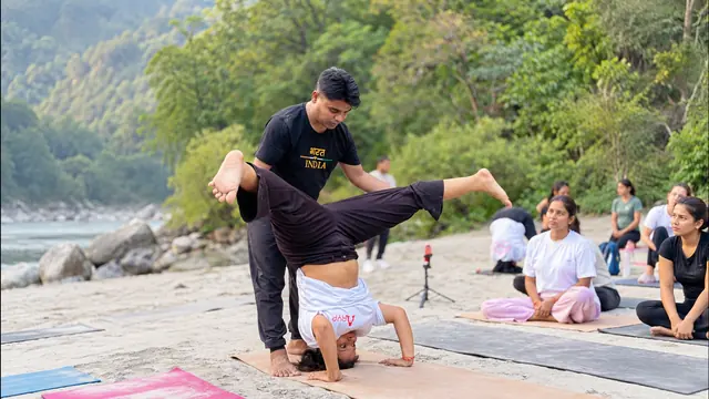 Beach yoga outdoor session by the sea